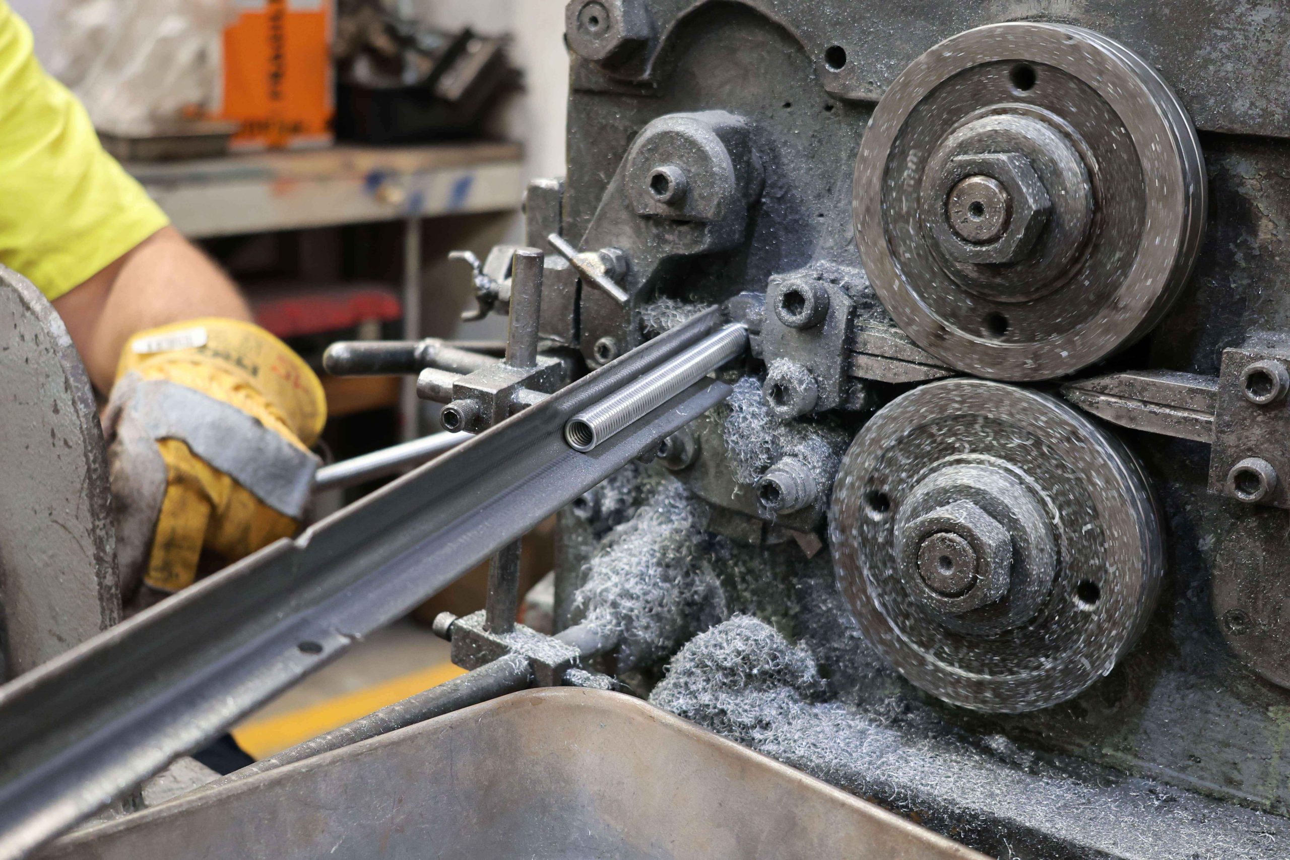 Custom-made coil spring being manufactured