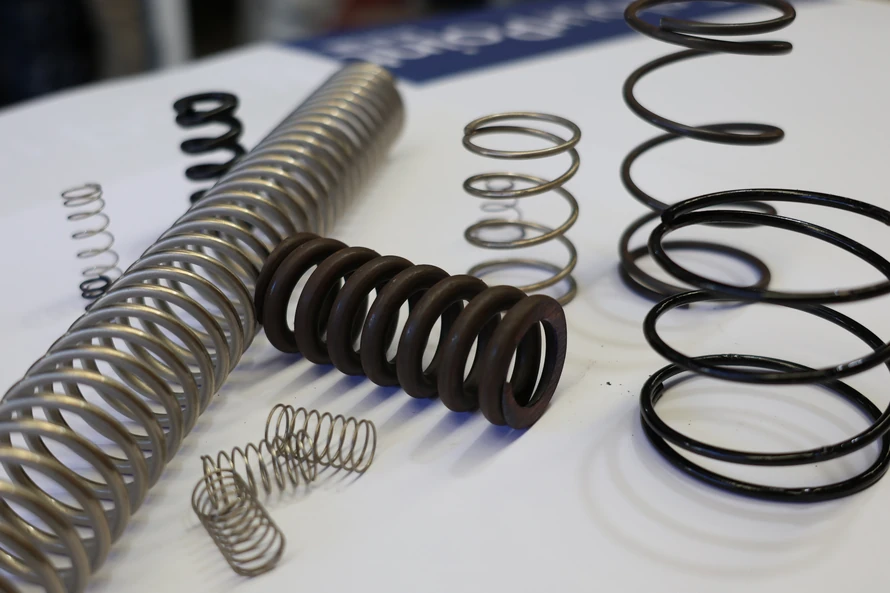 Industrial compression springs of different uses and sizes, custom-manufactured by Boynes Springs locally in Perth, Australia